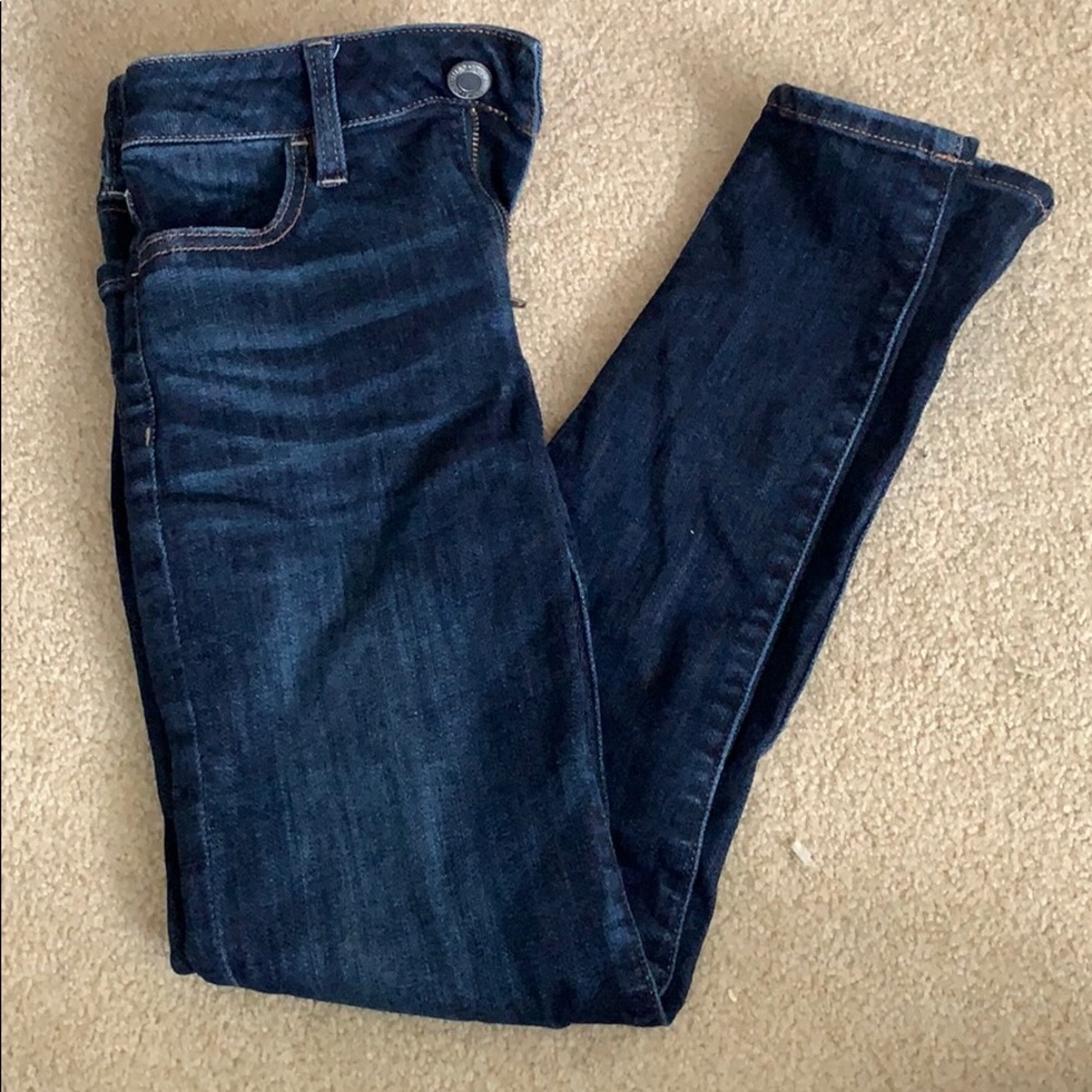 Dark washed high rise skinny jeggings
